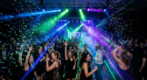 Company party dancing with confetti